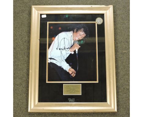 Michael Jackson, 1958-2009, photo and autograph, mounted in a display frame, 60 x 48cm overall