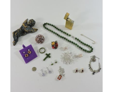 A collection of costume jewellery, to include a jade bead necklace, brooches, earrings, a Dunhill lighter and a small carved 