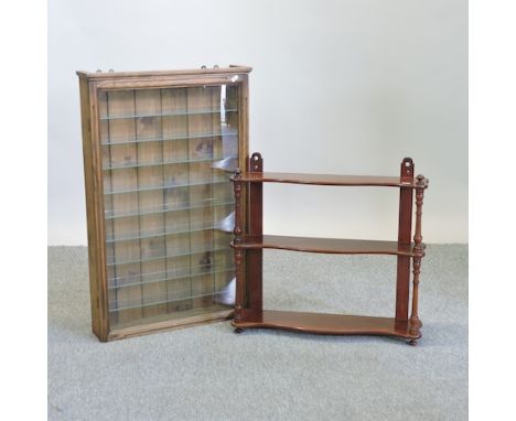 A pine glazed hanging cabinet, together with a mahogany wall shelf, 61cm 