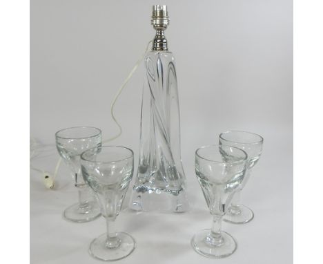 A Baccarat crystal table lamp base, together with a set of four 19th century French wine glasses, 15cm high