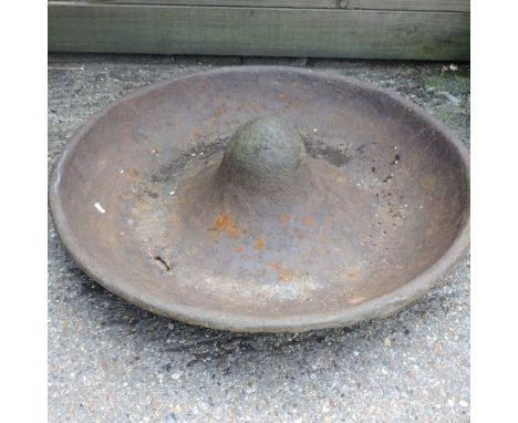A cast iron pig trough, 85cm diameter