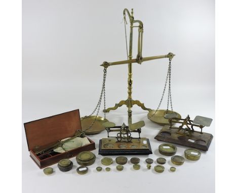 Four various sets of scales and weights, largest 51cm high