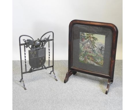 A mahogany fire screen, inlaid with a tapestry panel, together with a metal fire screen, in the form of an heraldic shield, 5