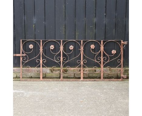 An ornate wrought iron garden gate, 166cm