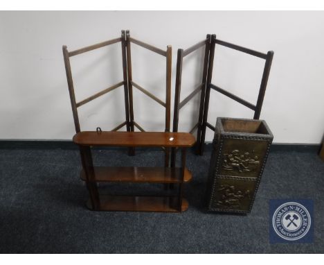 A set of mahogany wall shelves together with two folding towel rails and brass embossed stick stand 