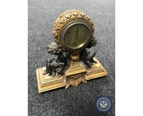 A continental gilt eight day mantel clock