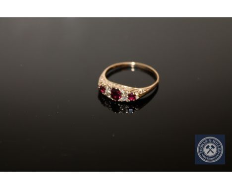 An antique ruby and diamond ring, size M, 2g.