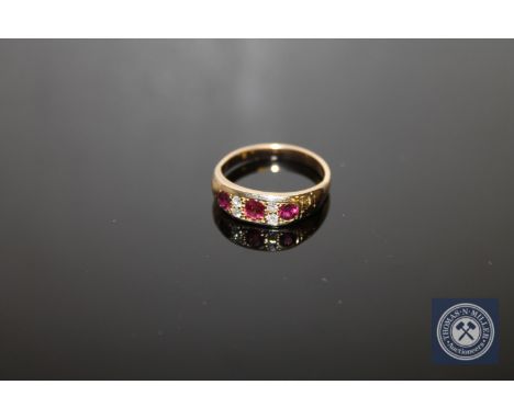 An antique 18ct gold ruby and diamond ring, 3.9g, size N/O.