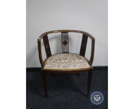 A Victorian inlaid mahogany tapestry seated  elbow chair 