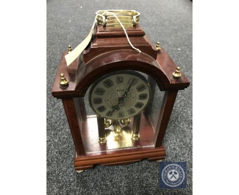A Kundo quartz mantel clock CONDITION REPORT: Generally in good condition though does not appear to be running. 