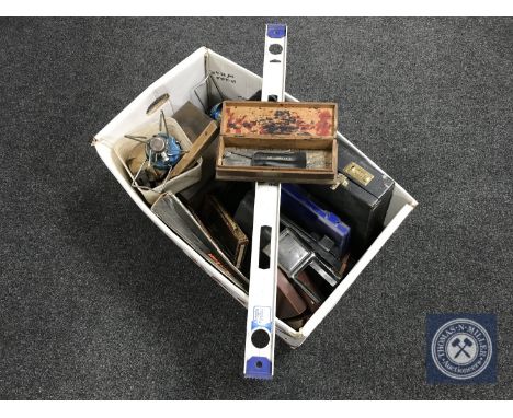 A box containing a large quantity of assorted power tools, drill bits, ring spanners, together with a drill stand and a car j
