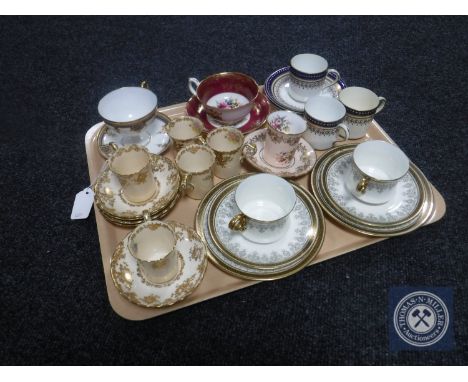 A tray of assorted teacups and saucers including Paragon, Hammersley etc
