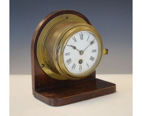 Brass cased ships clock, the white enamel dial with Roman numerals   Condition: 