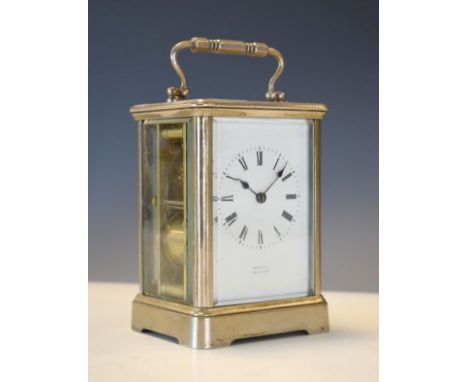 Silvered brass carriage clock, the Roman enamel dial inscribed Russell, Malvern, overall height including handle 17cm   Condi