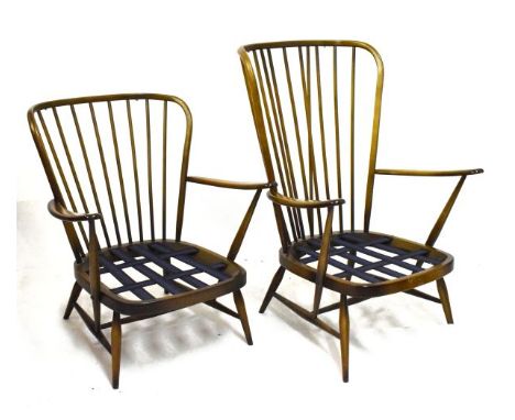 Two Ercol easy chair frames   Condition: 