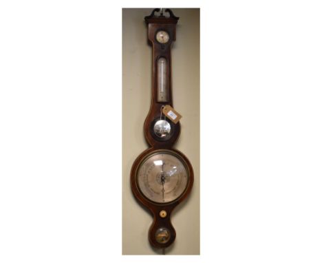 19th Century mahogany wheel barometer having a silvered dial, scale, level and hygrometer   Condition: 
