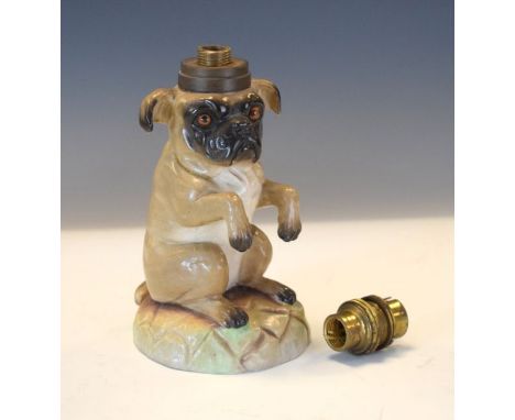 Late 19th/early 20th Century porcelain oil lamp base formed as a begging dog, fitted glass eyes, height to the top of the dog