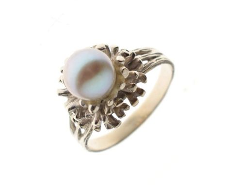 Pearl set dress ring having three white metal tiers of naturalistic design, the shank stamped '14K', size U, 6.8g gross   Con