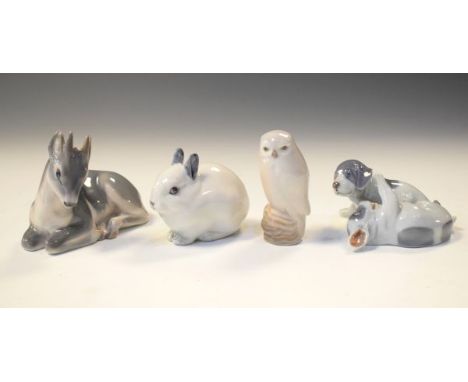 Four Royal Copenhagen figures - Fawn, Rabbit, Puppies Playing and Small Owl   Condition: 