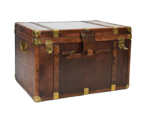 Reproduction leather bound cabin trunk having brass fittings and mounts   Condition: 