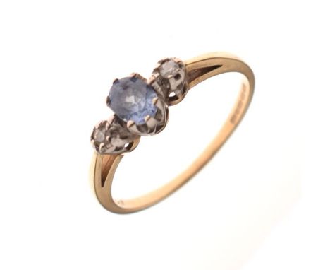 9ct gold dress ring set pale sapphire and two diamonds, size P½, 2g gross approx   Condition: 