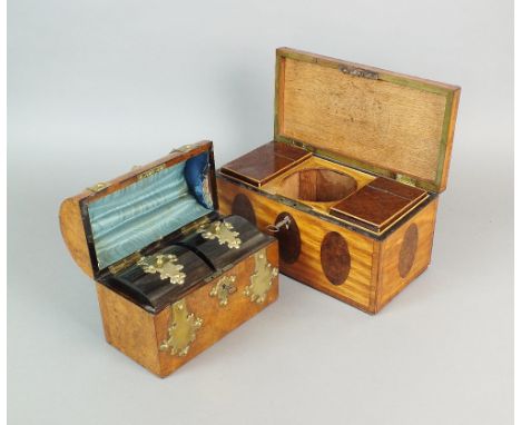 A Victorian figured walnut and brass mounted dome top tea caddy with two brass mounted coromandel lidded divisions, 22cm wide