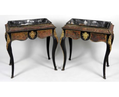 A pair of Napoleon III ormolu mounted boulle scarlet tortoiseshell brass inlaid rectangular jardiniere stands, each with the 