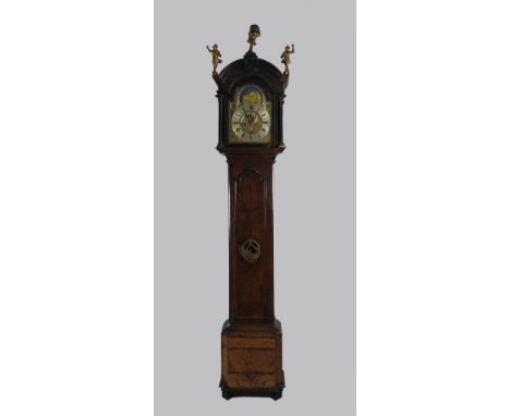 A mid 18th century Dutch burr walnut eight day longcase clock, the 12 inch arched brass dial signed 'William Redie, Inventeur