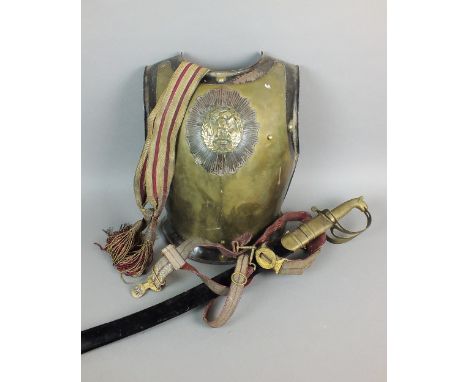 A French second Empire polished steel and brass carabiner's cuirass, 19th century comprising breast plate centred by a repous