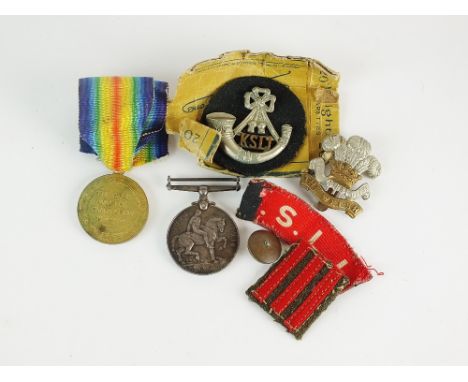 A pair of World War I medals; War medal 1914-18 and Victory medal, awarded to '73573 Sjt E.O. Richards, Welsh R.', together w
