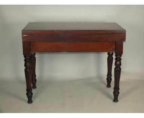 A Victorian mahogany bagatelle table, 19th century, the rectangular fold-over top enclosing a baize lined interior, the frame