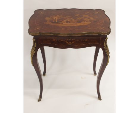 A FRENCH ROSEWOOD MARQUETRY DRESSING TABLE the hinged top inlaid with a couple in a landscape, with mirror interior and slidi