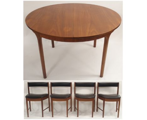 A MCINTOSH OF KIRKCALDY TEAK CIRCULAR EXTENDING DINING TABLE,74cm high x 122cm diameter with four dining chairs (5) Condition