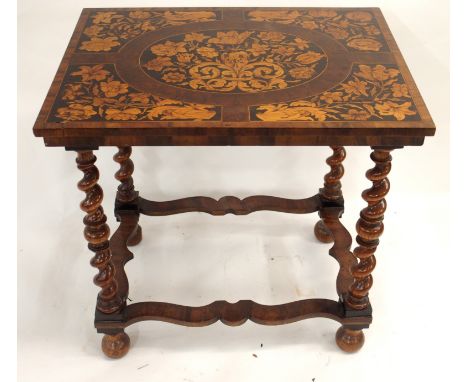 A WILLIAM AND MARY STYLE WALNUT AND MARQUETRY TABLE the rectangular top inlaid with panels of garden flowers and on spiral le