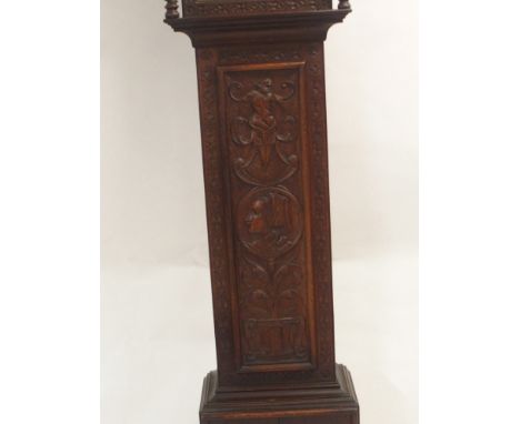 A 19TH CENTURY OAK LONGCASE CLOCK the silvered dial inscribed to Wm Wilks, Wolverton, Roman numeral chapter ring and brass ma