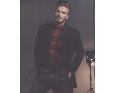 David Beckham signed 10x8inch colour photo. Good condition. All autographs come with a Certificate of Authenticity. We combin