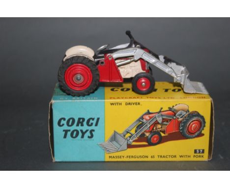 A Corgi Massey Ferguson 65 tractor with fork (57), displayed with a yellow and blue picture box.
