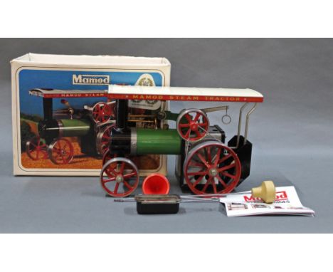 A boxed Mamod TE1A steam tractor with vaporizing spirit lamp, filler funnel, detachable steering extension and instructions 