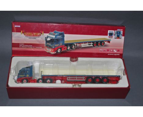 A Corgi limited edition 1:50 scale "Hauliers of Renown", Volvo FH Flatbed trailer, "R C Robinson's Haulage Ltd" (CC14021), re