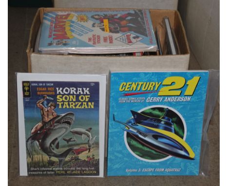 A box of 40+ comics and graphic novels, including DC, Goldkey, and Century 21, titles including "Classic Comic Strips from th