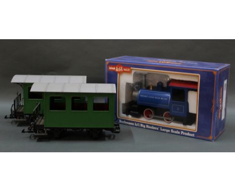 A Bachmann Li'l Big Hauliers short line rail road tank engine (91499), and two LGB Lehmann four wheel wagons.