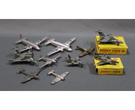 A group lot of diecast model fighter planes, comprising a Dinky 735 Gloster Javelin fighter, a 736 Hawker Hunter fighter, and