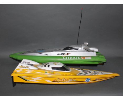 Two plastic model racing boats, comprising a Citrate K-Marine racing boat and a Hydro R-8 Jet Marine racing boat and a Ripsti