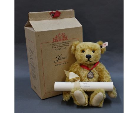 A Steiff Christie's "James" teddy bear, having golden brown mohair body, white tag (654725), limited edition, medallion, cert