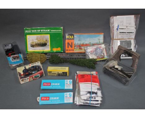 A group of narrow gauge and HO gauge model kits and accessories, comprising a Peco "James" loco body kit, Airfix series one 0