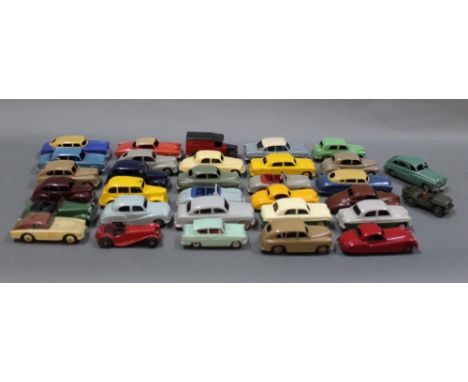 A group of 31 Dinky diecast model vehicles to include taxis  