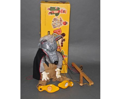 A Pelhan SL21 Wolf puppet, with original cardboard picture box.
