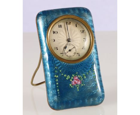 French easel clock having silvered dial with Arabic numerals and subsidiary seconds dial, within a guilloche enamel case deco