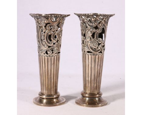 Pair of Victorian silver spill vases with pierced scroll and foliate band by William Hutton & Sons Ltd, 1900 London, 19cm tal