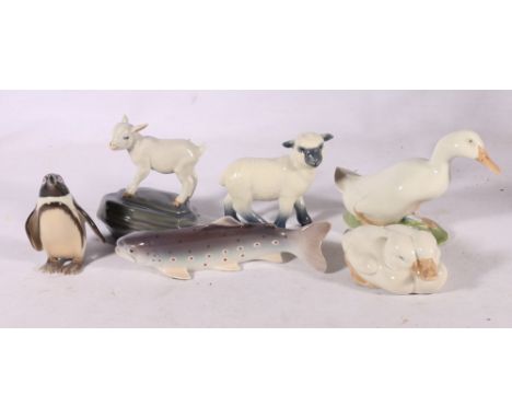 Six Royal Copenhagen models including goat (4760), lamb (758), duck (1192), ducklings (516), penguin (421) and fish (449). 